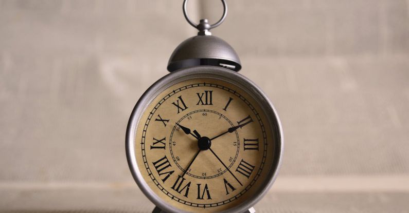 48 Hours - Gray Analog Clock Displaying at 10:36